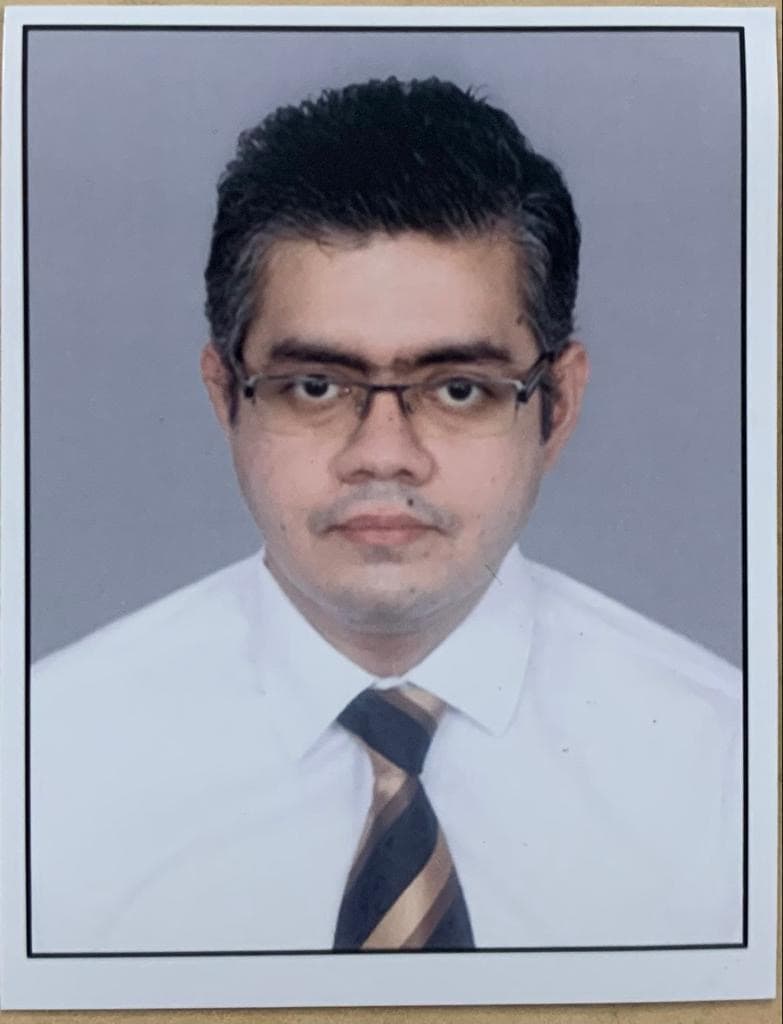 Portrait of Dr. Adesh J
